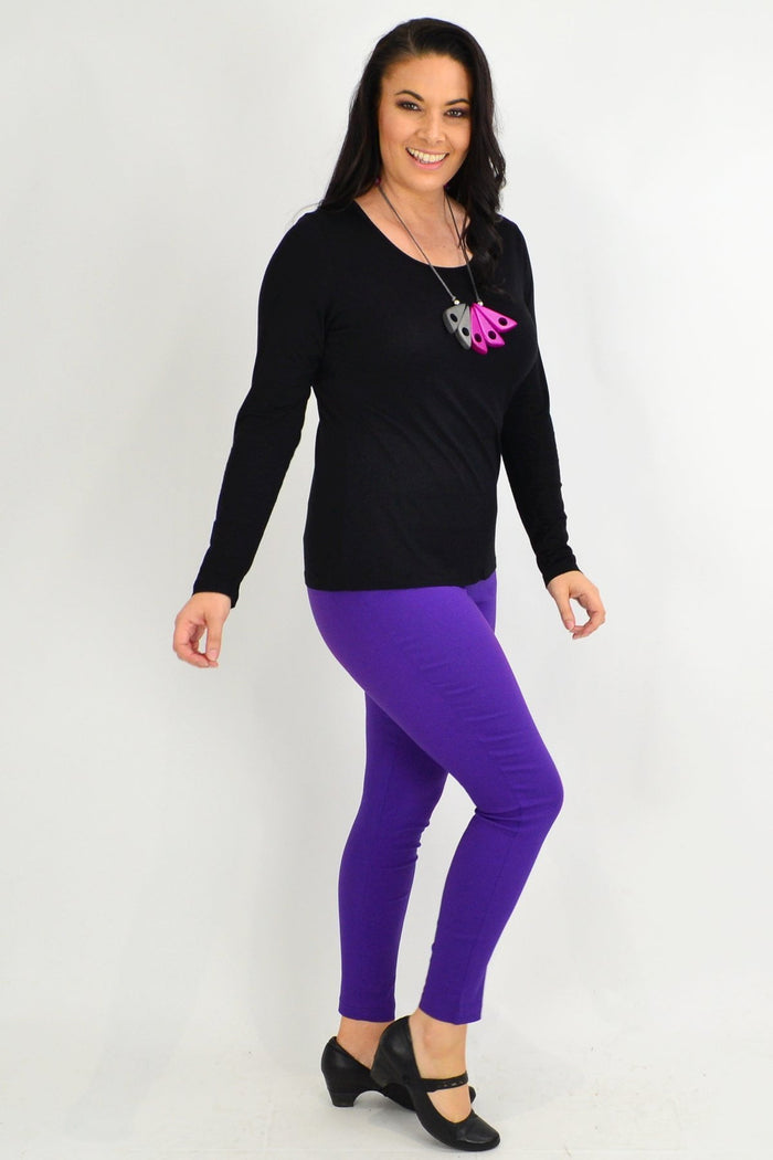 Black long sleeve scoop neck top by Whispers, a basic long-sleeve shirt with a simple, classic design on a neutral background.