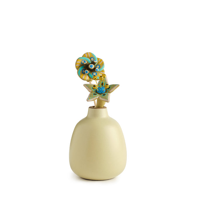 Carla Fernandez Ceramic Circle Flower in Lemon Rind in a Heath Ceramics Bud Vase in Lemon Rind
