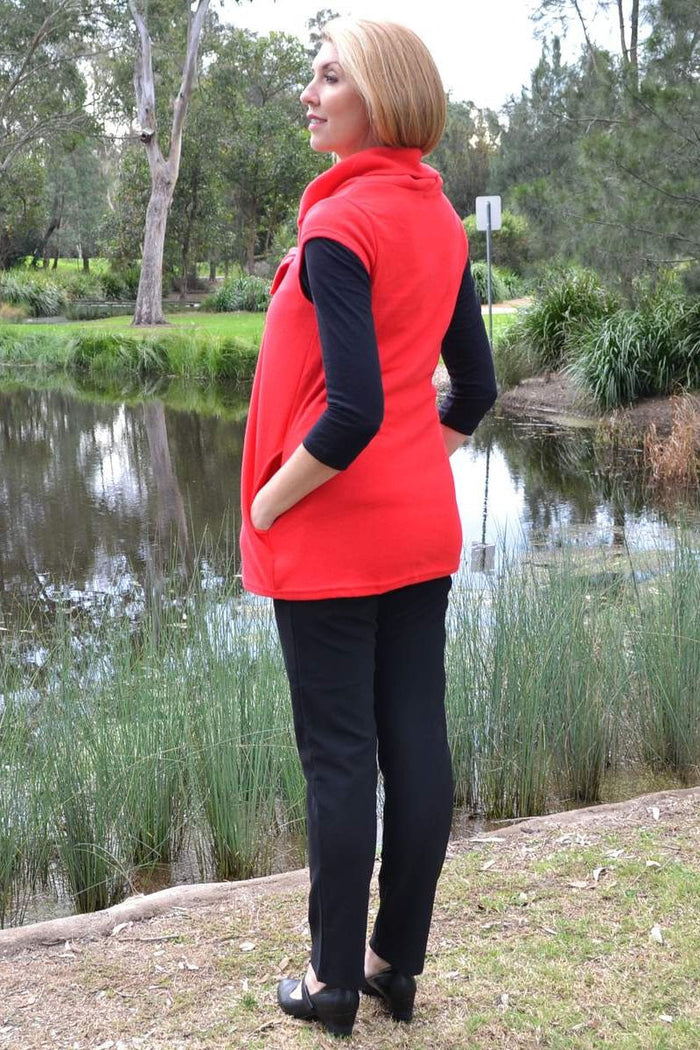Red Robin Tunic by Quelque, a stylish casual tunic with a relaxed fit and vibrant red color, displayed on a model.