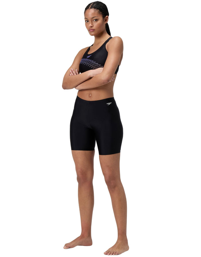 Black Speedo essential solid swim long shorts for women with textured waistband