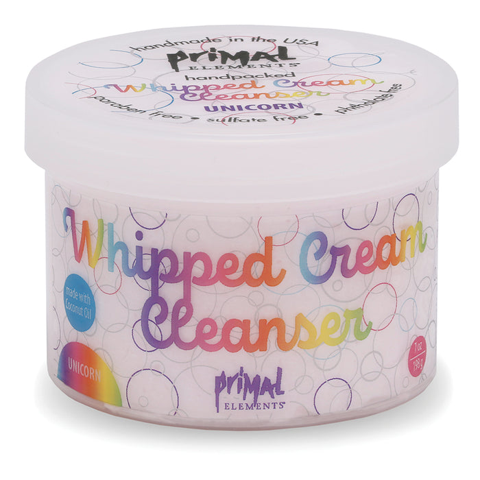 Unicorn Whipped Cream Cleanser | Primal Elements in a colorful, round container highlighting skincare benefits with a focus on natural ingredients and handmade quality.