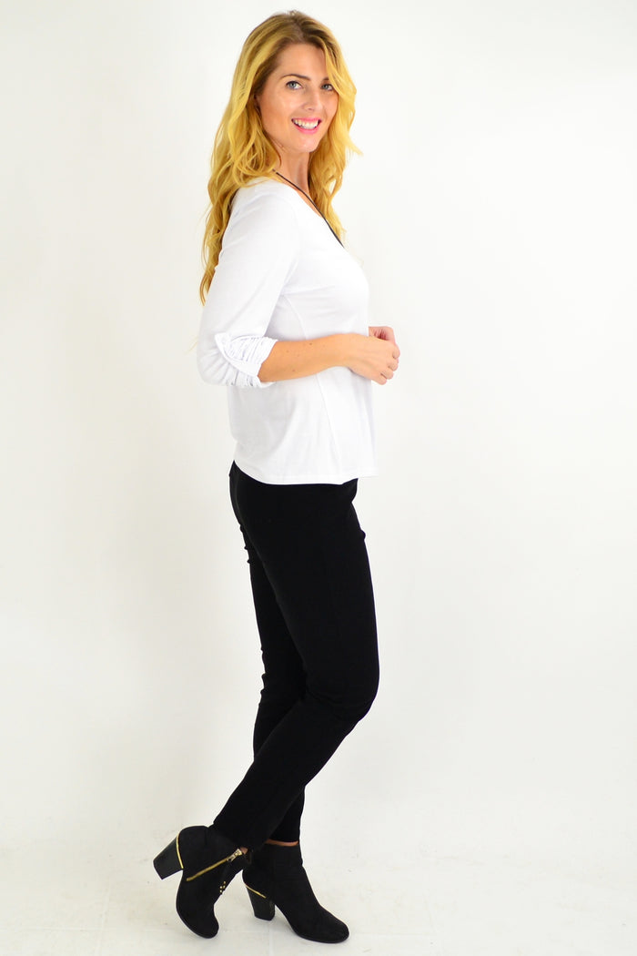 White Lilia long sleeve button-up basic top, full view showing classic collar and clean design for versatile everyday wear.