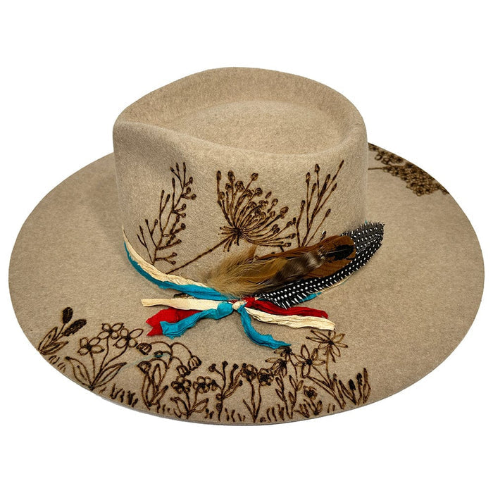 Tan Western hat with floral embroidery and feathers