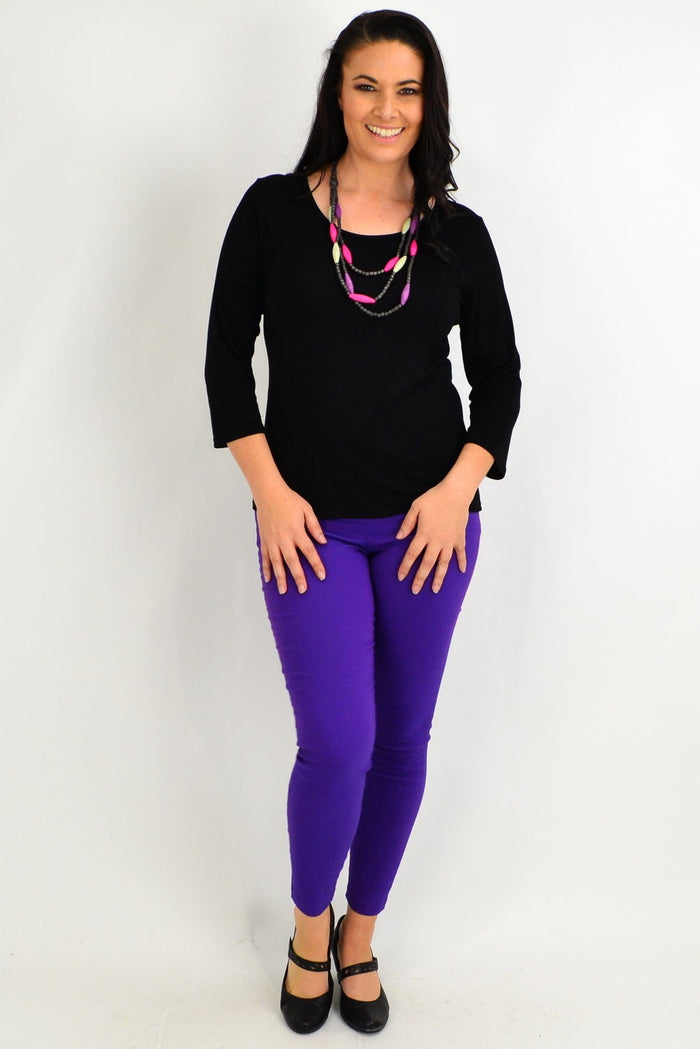 Black 3/4 sleeve scoop neck basic top by Lilia, showcasing a simple, fitted design made from soft fabric.