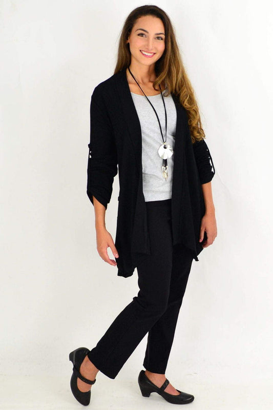 Black textured cardigan from I Love Tunics, outerwear with a cozy knit pattern, shown on a hanger against a plain background.