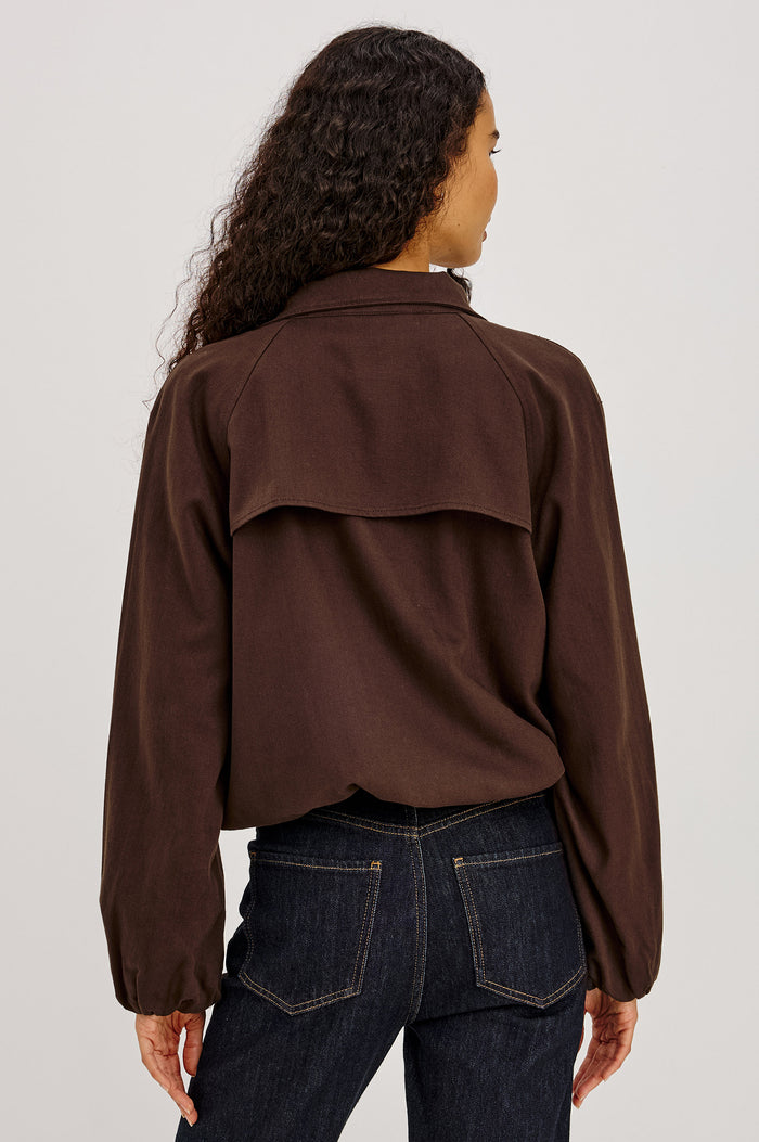 Blake Jacket in TENCEL™ Denim With Relaxed Fit, High Funnel Neck, Double Button Closures, Drop Shoulder Sleeves With Elastic Cuffs, and Cropped Drawstring Hem in Espresso Colorway - Upper Body Back View Featured on Model