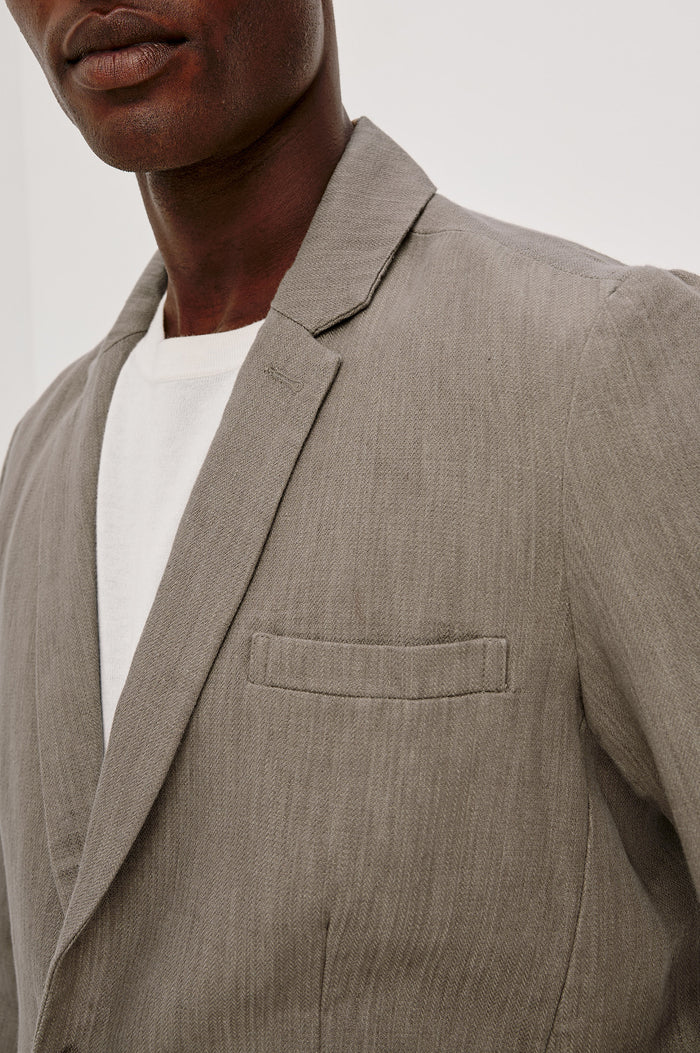 Bond Blazer in Cotton Wool Linen Blend, Single-Breasted, Notched Lapels, Chest Welt Pocket, Front Patch Pockets, and Long Sleeves With Button Cuffs in Walnut Colorway - Upper Body Front View Featured on Model