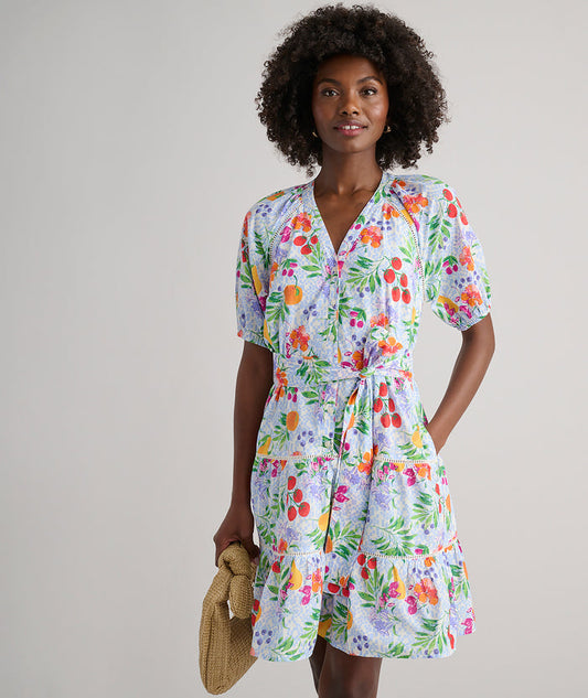 Model is wearing UNTUCKit Sierra dress in fruit print.