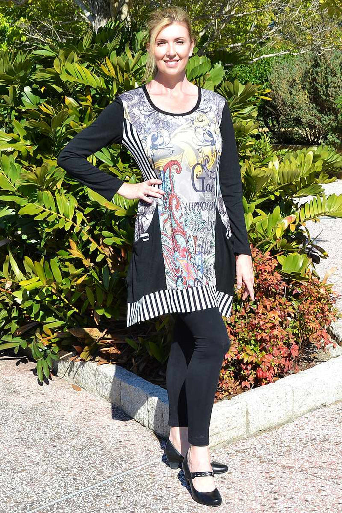 Jenny May Emily Tunic Top displayed on a hanger, featuring a relaxed fit and soft fabric in a neutral color.