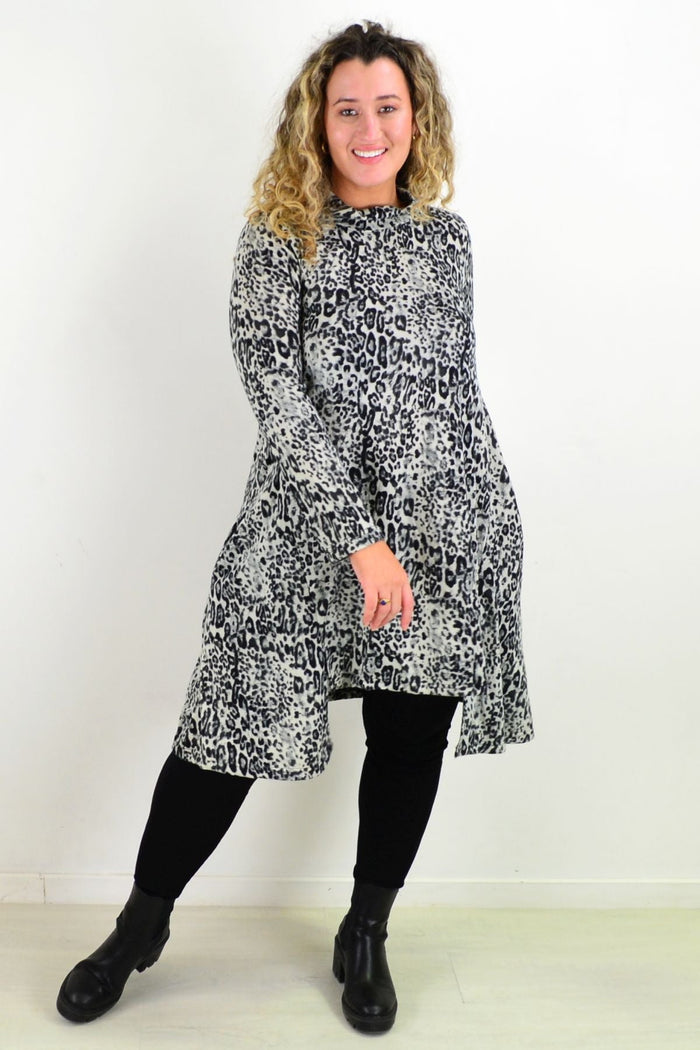 Leopard print fleece tunic dress by Hourglass, featuring a cozy, relaxed fit with long sleeves and a stylish animal pattern.
