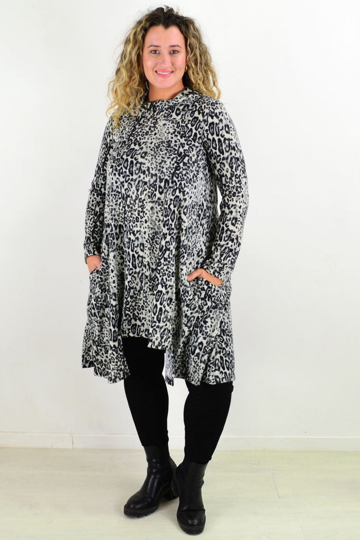 Leopard print fleece tunic dress by Hourglass, featuring a cozy, stylish design with long sleeves and a relaxed fit.