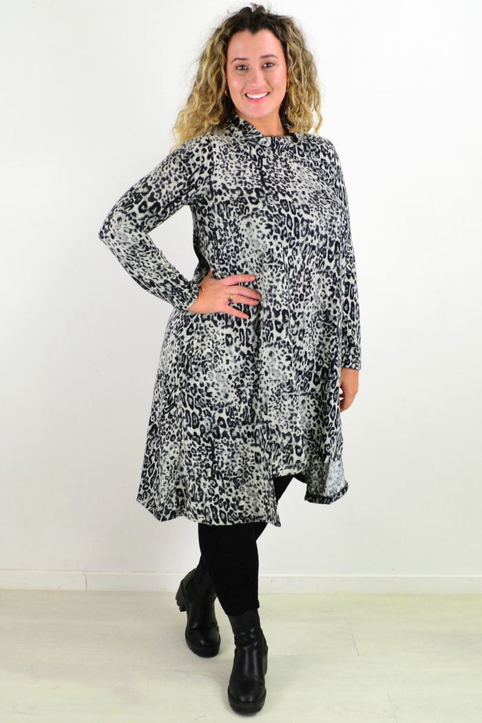 Leopard print fleece tunic dress by Hourglass, featuring a cozy, relaxed fit and stylish animal pattern, shown on a model.