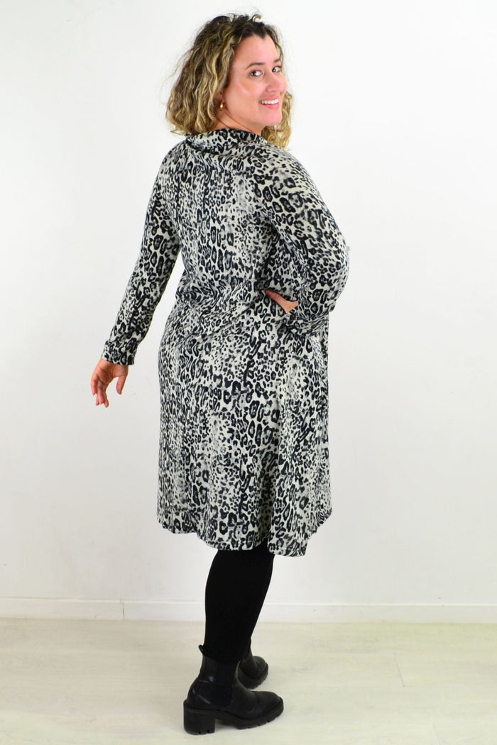 Leopard print fleece tunic dress by Hourglass featuring a cozy, relaxed fit and stylish animal print fabric.