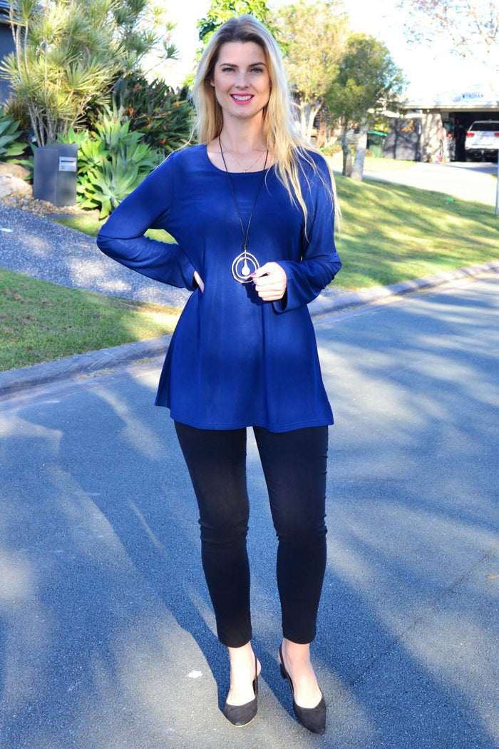 Navy Lilia long sleeve button-up tunic top, basic style, shown on a mannequin with a relaxed fit and classic collar.