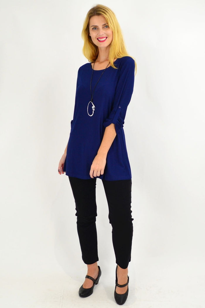 Navy button-up long sleeve tunic top by Lilia, basic style with a relaxed fit, shown on a white background.