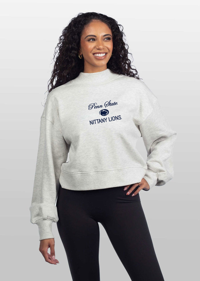 Penn State Nittany Lions Women's Ash-Grey Relaxed, waist-length Heavyweight Fleece Sweatshirt with mock neck, drop shoulders and balloon sleeves