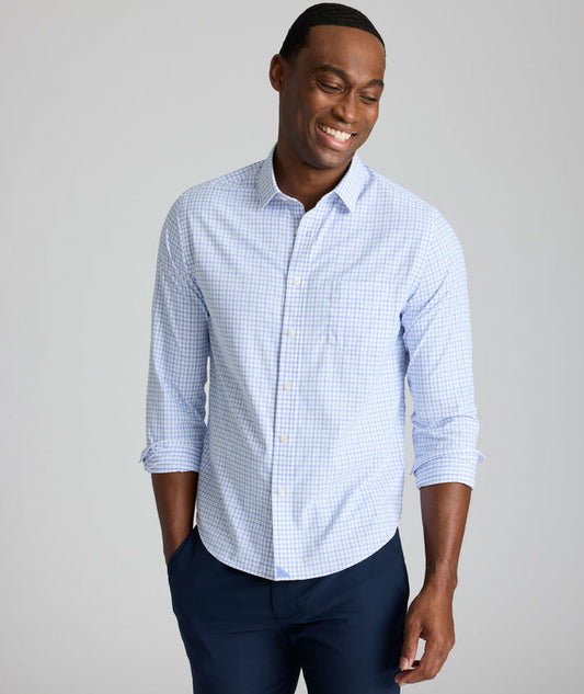 Model is wearing UNTUCKIt northcliffe performance check shirt in purple.