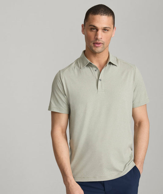 Model is wearing UNTUCKit Clavidor performance polo in shadow.