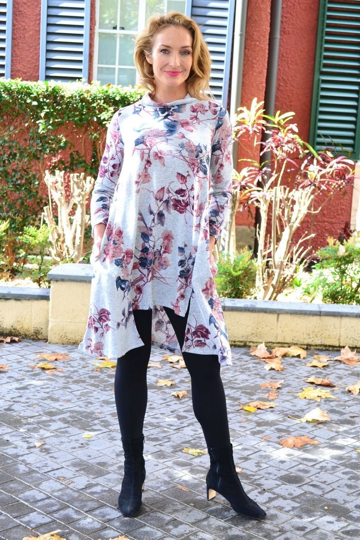 Pink autumn leaf fleece tunic dress by Hourglass, featuring cozy fabric and a relaxed fit with leaf print details.
