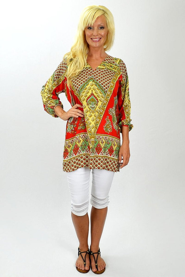 Pink Diamond Raj Red Tunic Top displayed on a hanger, featuring a comfortable fit and vibrant red color, ideal for casual wear.
