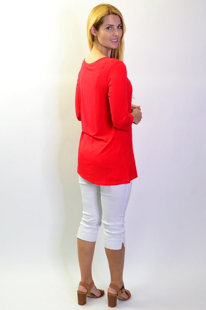 Red bamboo 3/4 sleeve jersey tunic top from La Bay, showcasing a comfortable, casual basic with a relaxed fit.