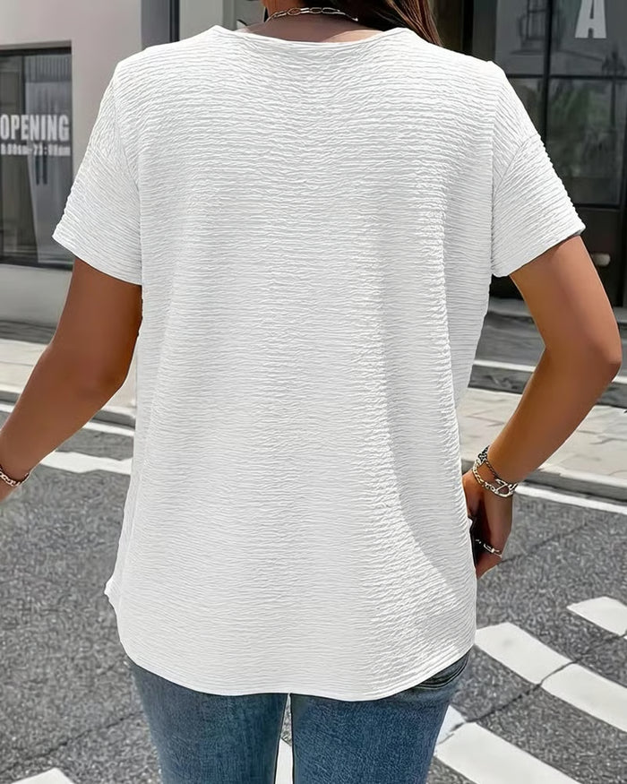 Syzelle - T-shirt femme col rond texturé manches courtes boutons décoratifs élégant
