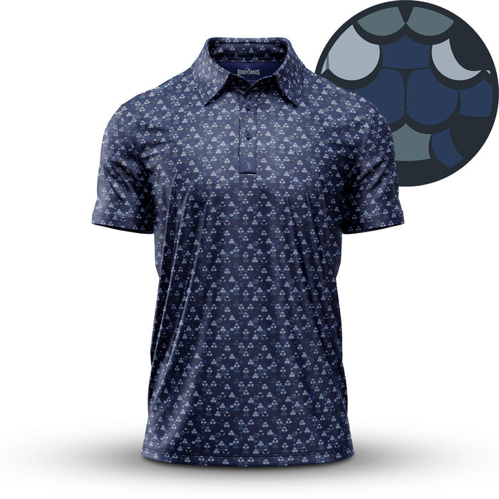 The Whale Tail - Navy - Polo is an athletic-fit, navy short-sleeve shirt with a white and light blue geometric pattern, UPF 50 protection, and overlapping scales detail, shown on a white background.