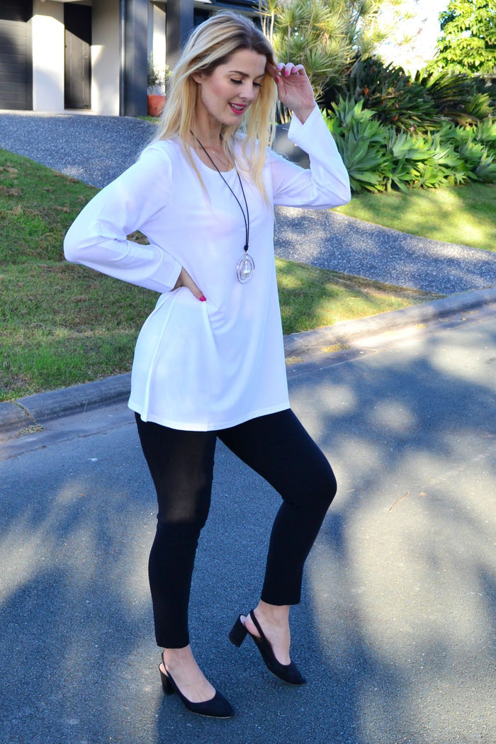 Lilia white button-up long sleeve basic tunic, classic and versatile for casual or professional wear.