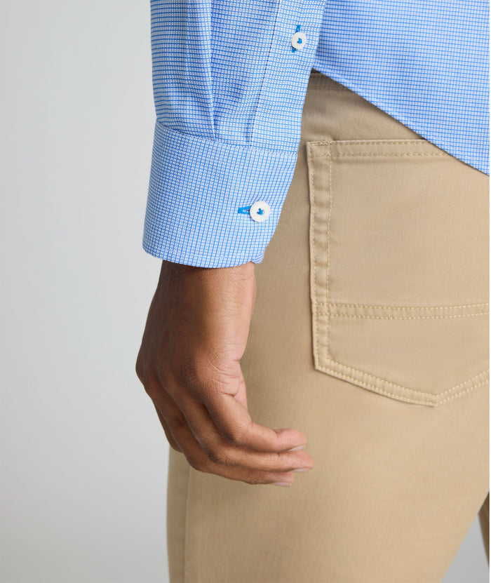 Model is wearing UNTUCKit Jamison wrinkle-free blue print long sleeve.